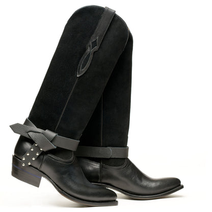 Black knee-high boot with side wrap strap and small metal studs