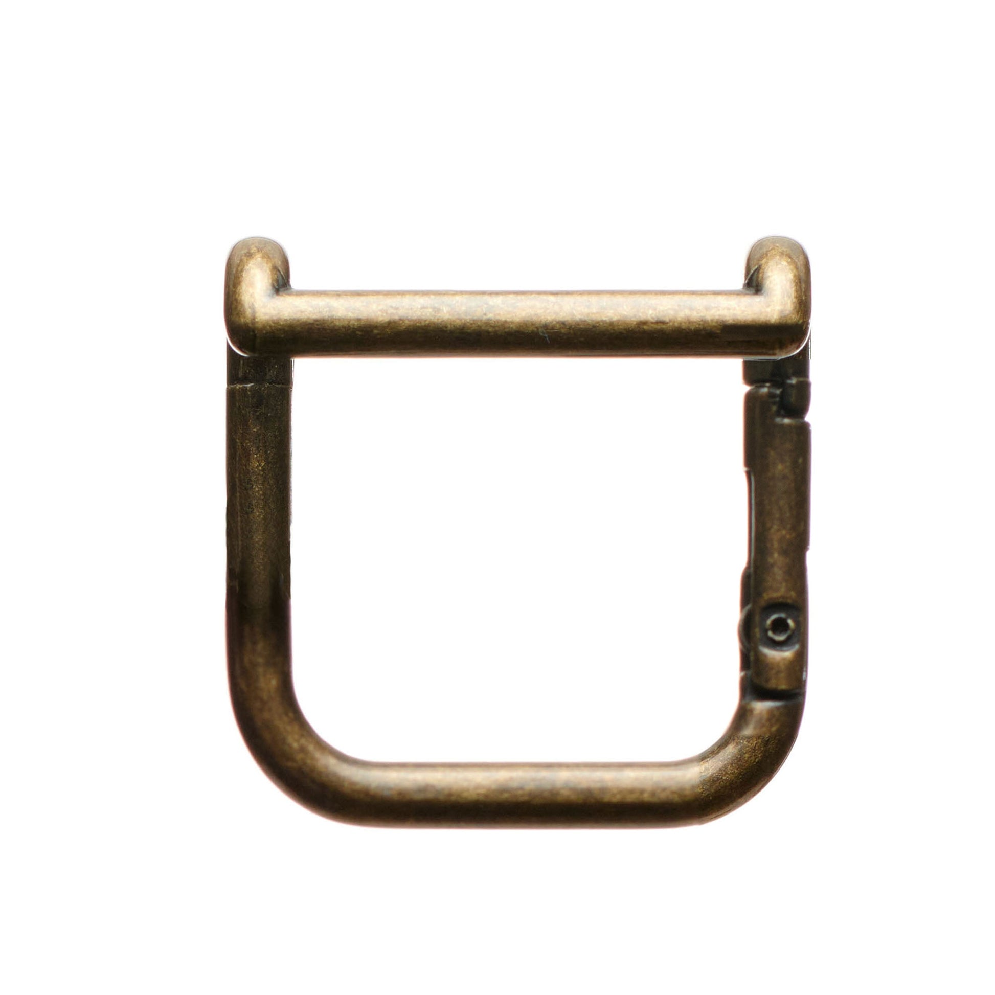 Boot mule metal clasp detail with U-shaped ring and hinged bar lock