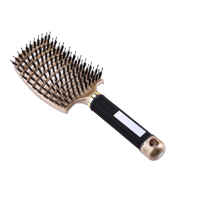 Beige massage hair comb with textured grip handle and dense mixed bristles