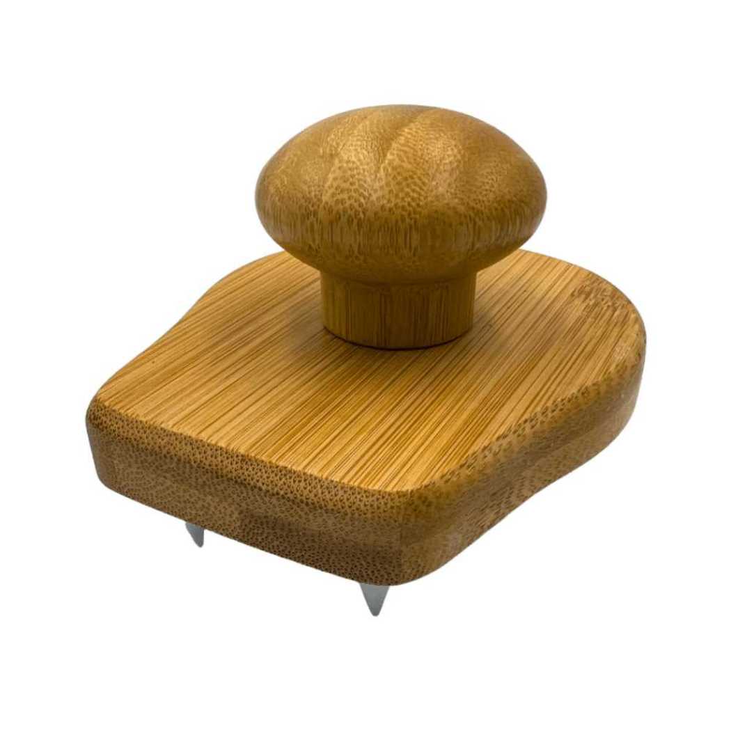 Wooden hair and scalp massaging brush with rounded top massage pad