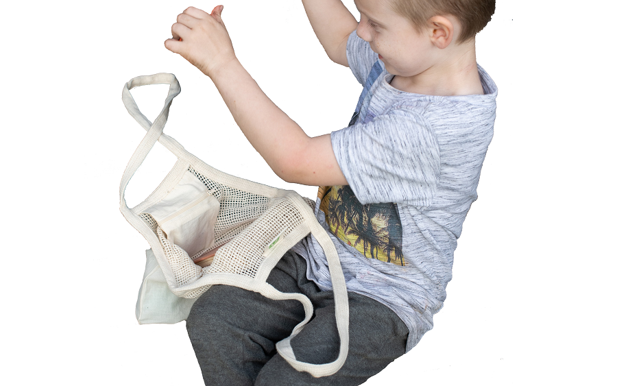 Beige mesh tote bag worn by a child, showing mesh body and handles