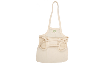 Beige fabric tote bag with mesh front panel and long handles