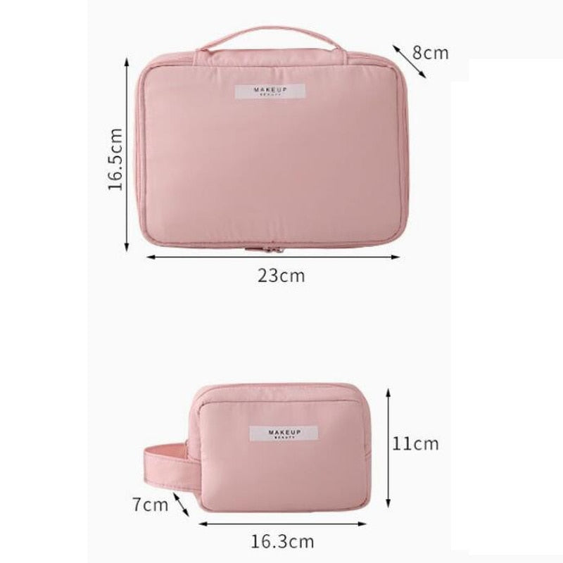 Pink cosmetic bag with top handle and front zip pocket