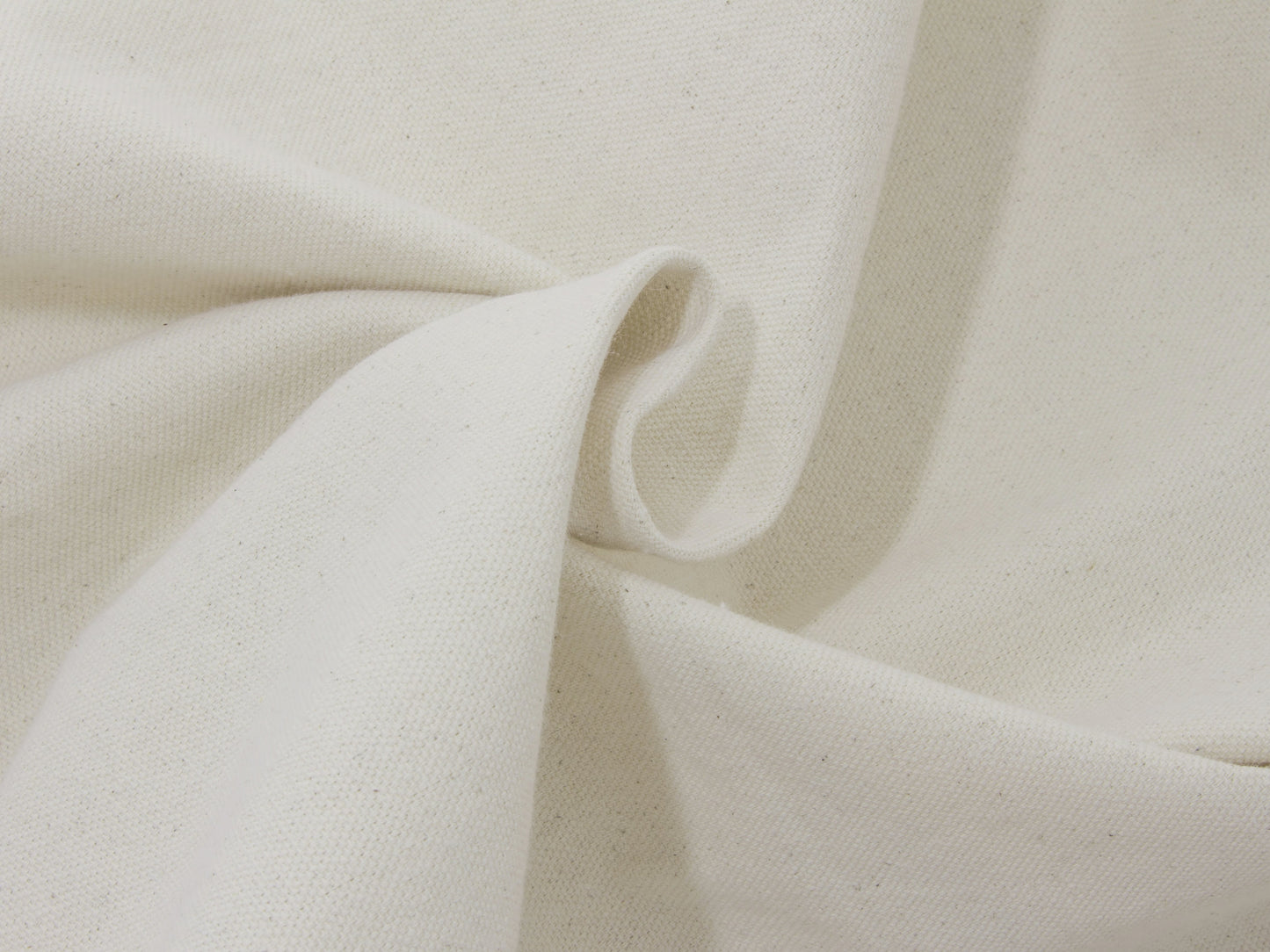 Comforter storage bag fabric close-up, beige textured weave with seam