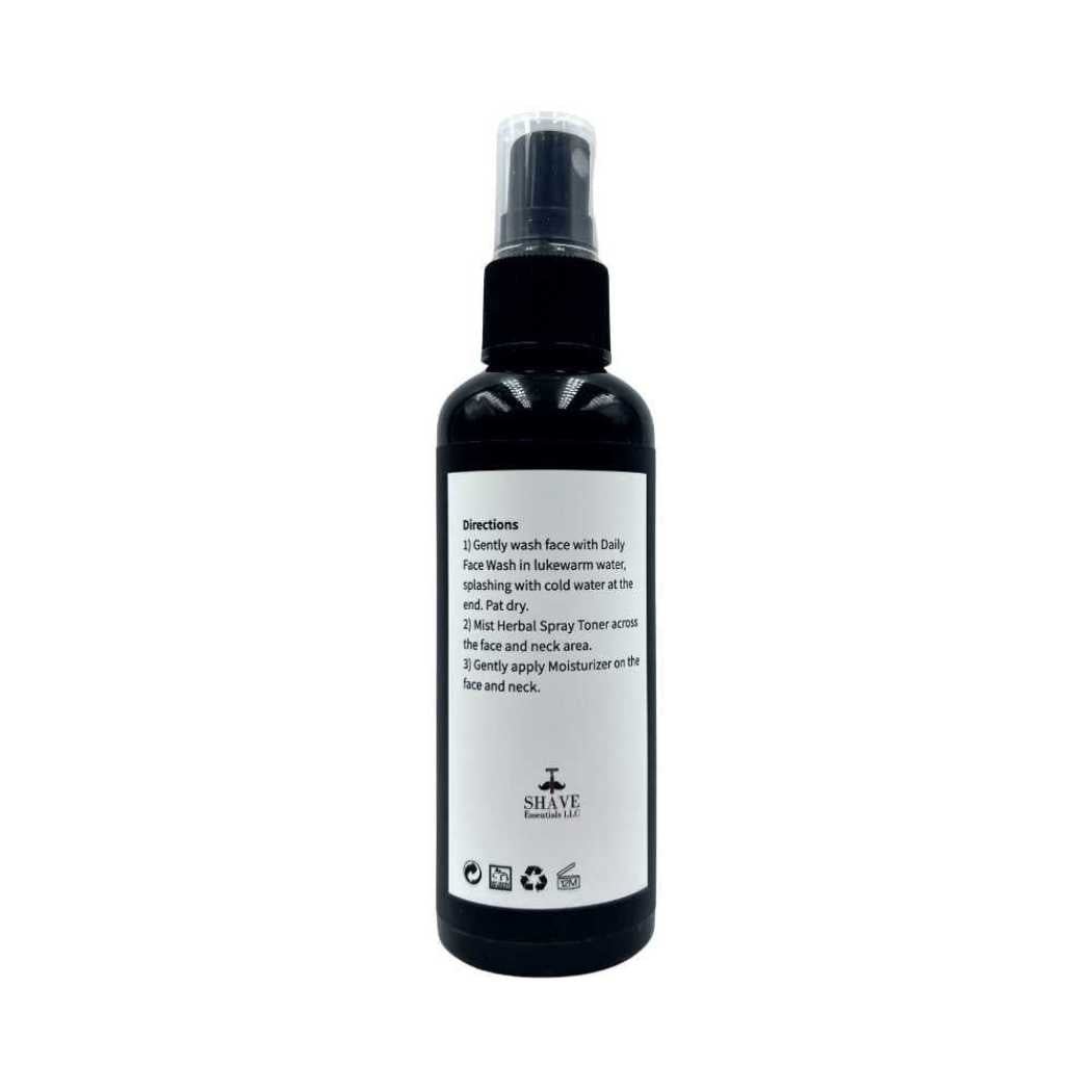 Herbal spray toner bottle with black pump sprayer, back label shown