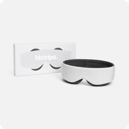 Eclipse sleep mask with dark eye cups and adjustable strap