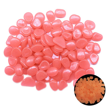 Glow-in-the-dark garden pebbles, rose-pink translucent smooth stones