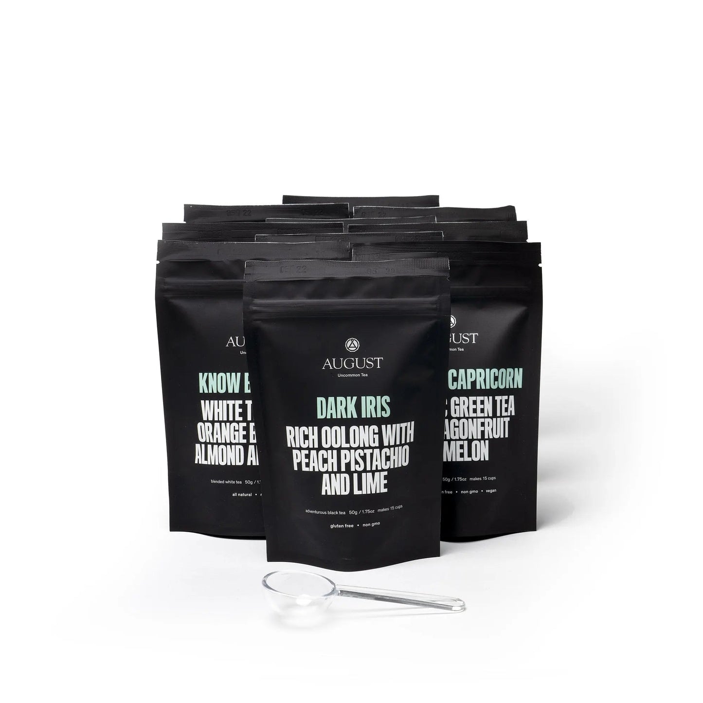 Iced tea bag set with black pouches and a measuring scoop
