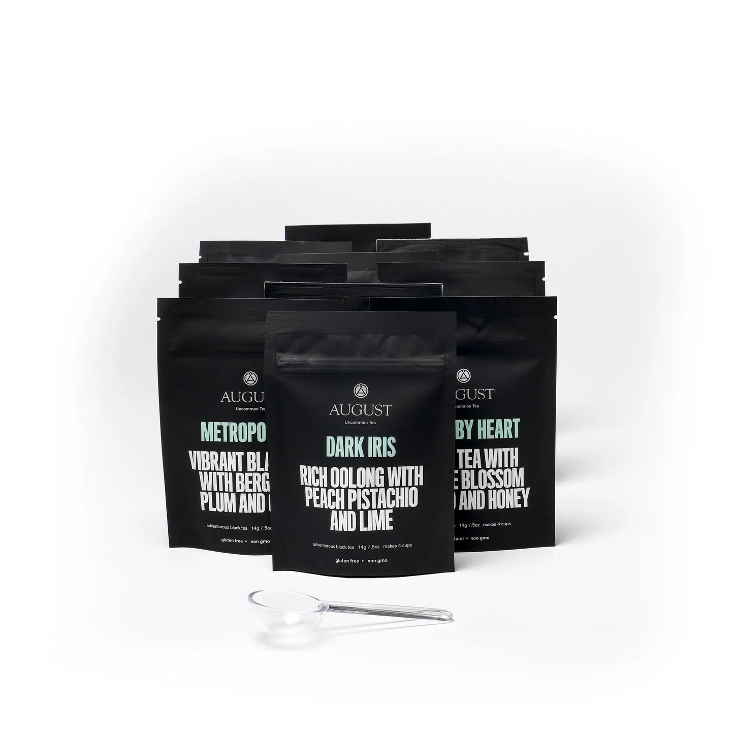 Iced tea sampler set with multiple black tea bag pouches and measuring scoop
