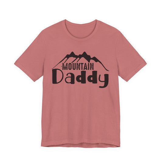 Dusty rose graphic T-shirt with mountain logo and "Mountain Daddy" print at chest