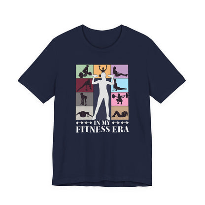 Navy strength T-shirt with colorful fitness collage graphic and “IN MY FITNESS ERA” text