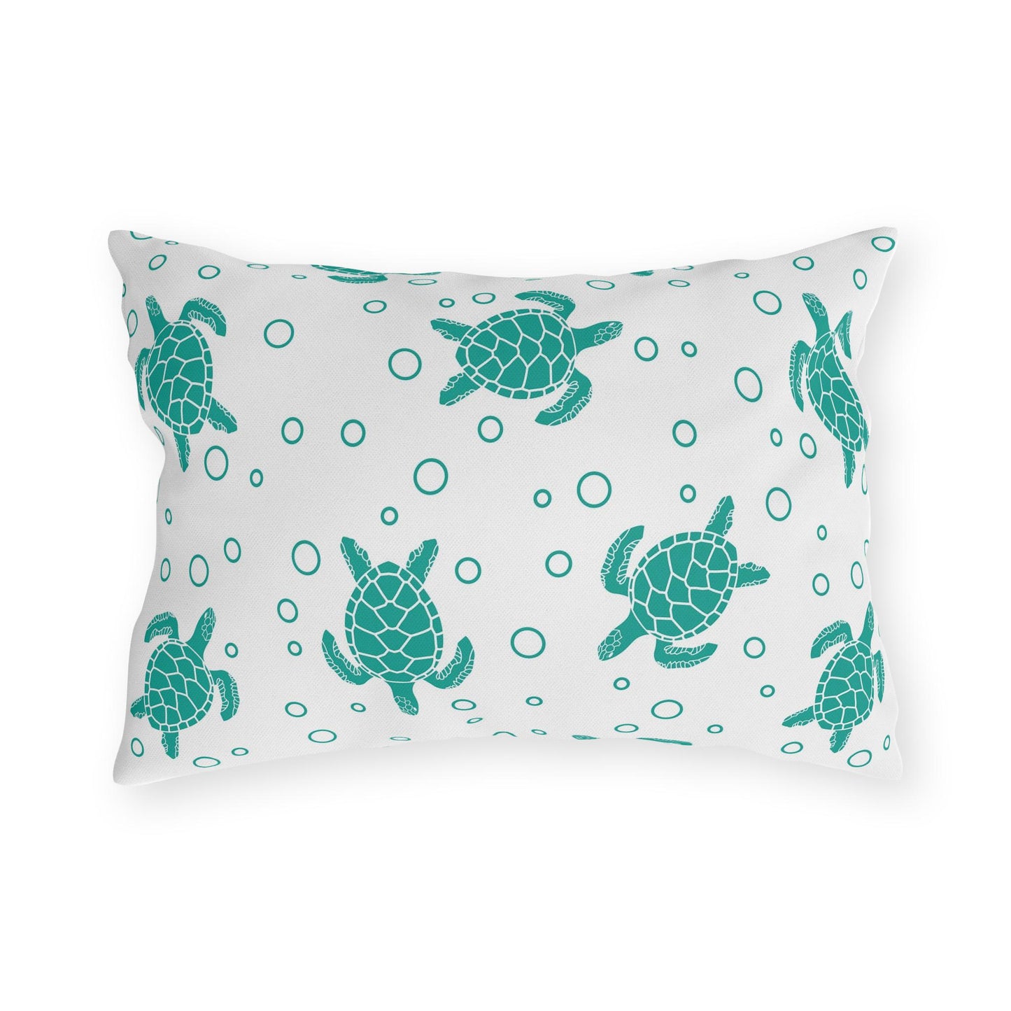 Sea turtle outdoor pillow with repeating teal turtle and bubble dot pattern on light fabric