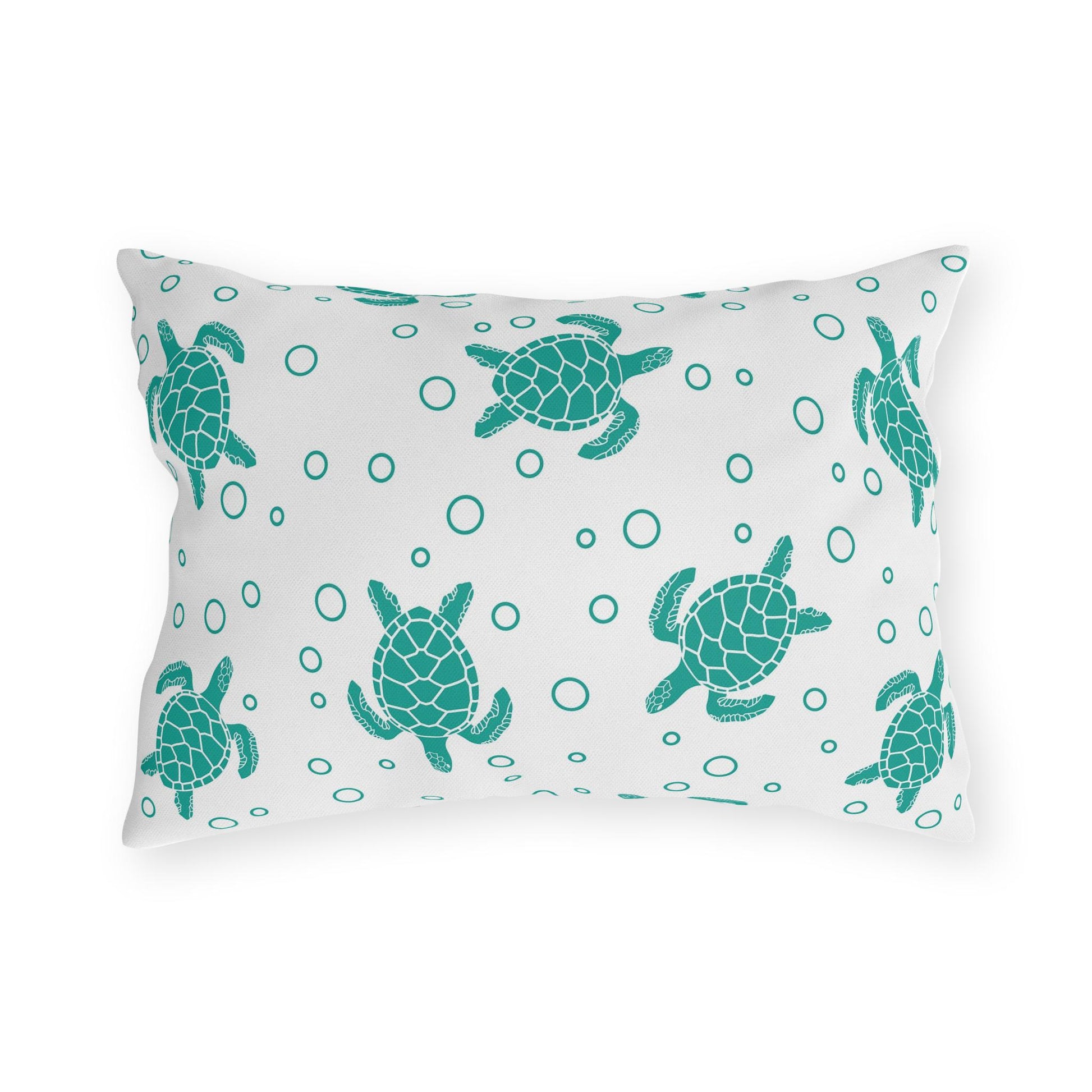 Sea turtle outdoor pillow with repeating teal turtle and bubble dot pattern on light fabric