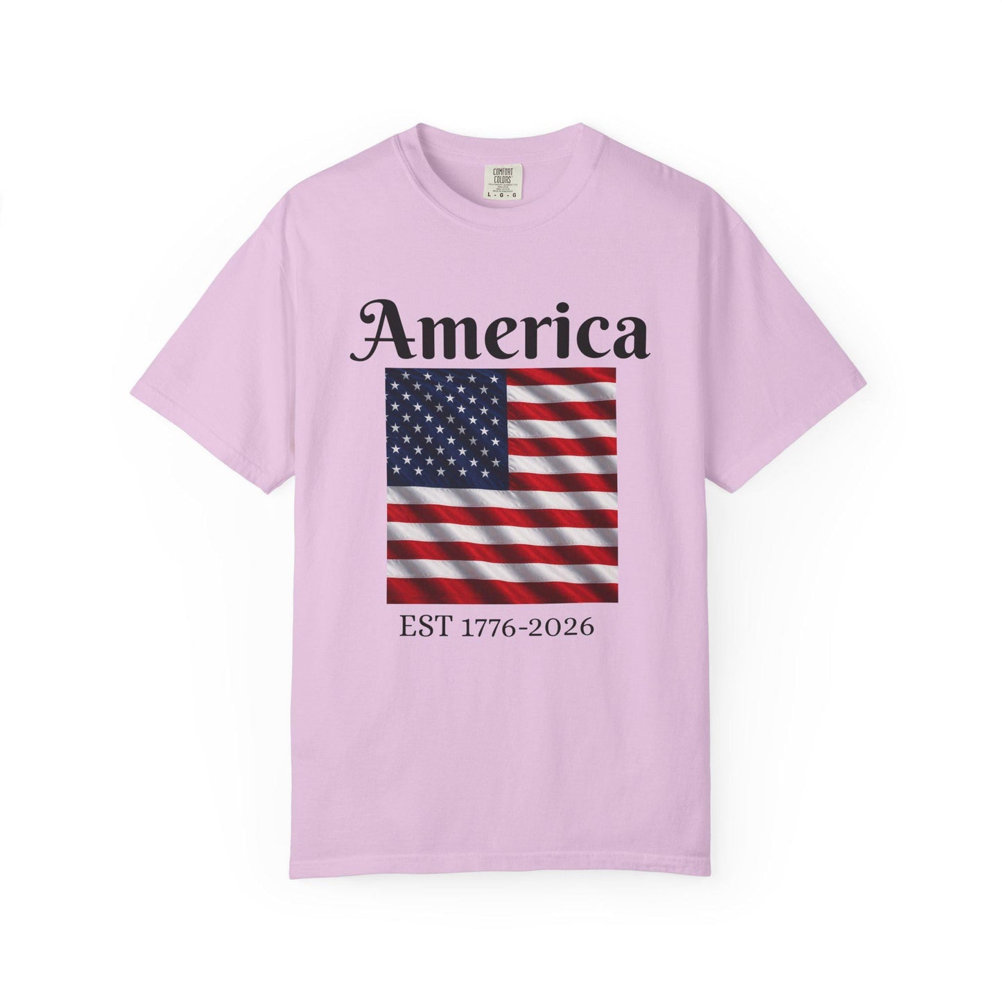 Light purple t-shirt with America text, American flag, and EST 1776-2026