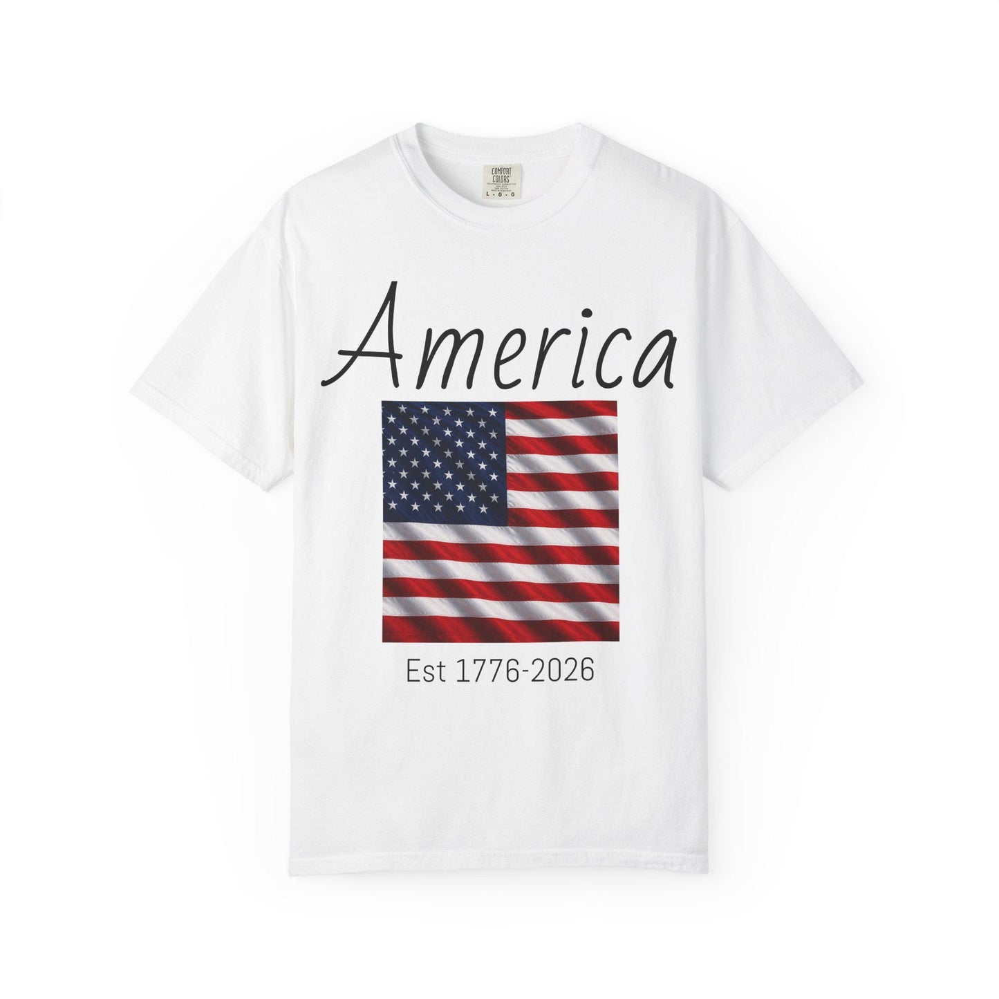 White T-shirt with 'America' script, U.S. flag graphic, and 'Est 1776-2026'