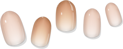 Set of nude gradient gel nail wraps with five oval press-on nails