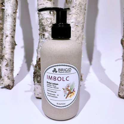 Natural body lotion bottle with black pump, speckled light beige bottle and label