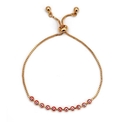 Charm bracelet with gold cord and red-and-blue evil-eye bead row