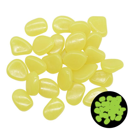 Glow-in-the-dark garden pebbles, yellow-green translucent oval stones