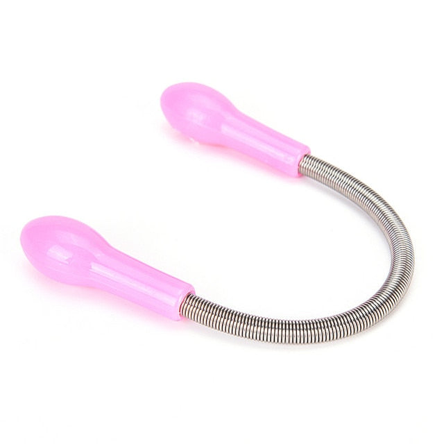 Pink hair remover tool with flexible cord and metallic spring connector