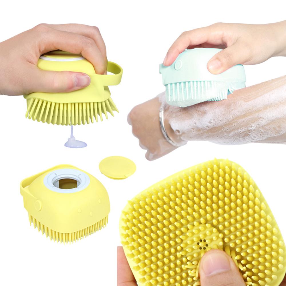 Yellow dog bath brush with soft bristle comb head and cleaning surface dots
