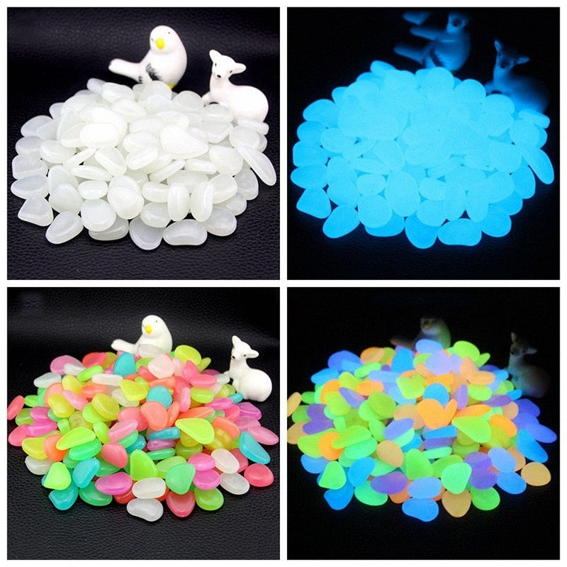 Glow-in-the-dark garden pebbles with white and blue glowing piles on black