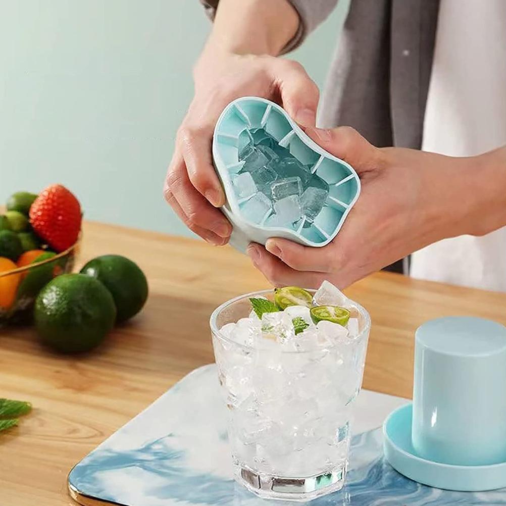 Blue silicone ice maker bucket showing an ice tray filled with ice cubes
