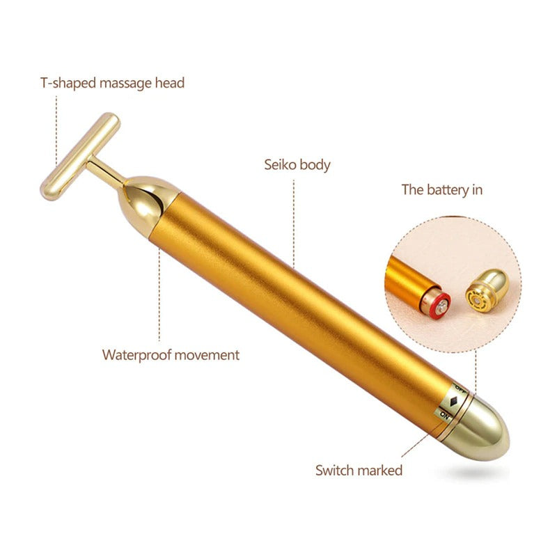 Gold T-shaped facial roller massager with rounded battery handle and base