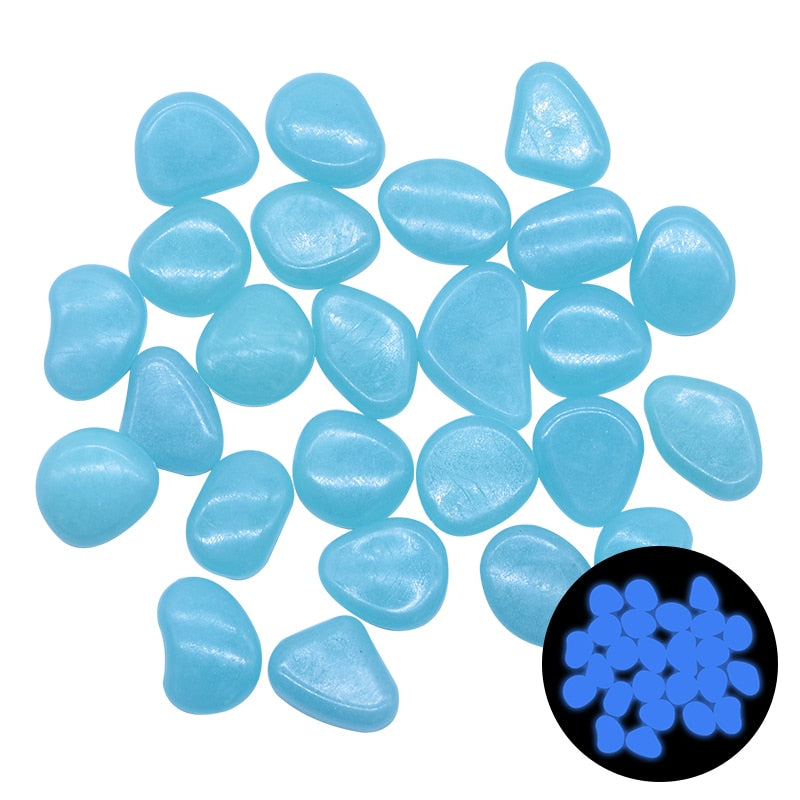 Glow-in-the-dark garden pebbles in sky blue, translucent oval pieces