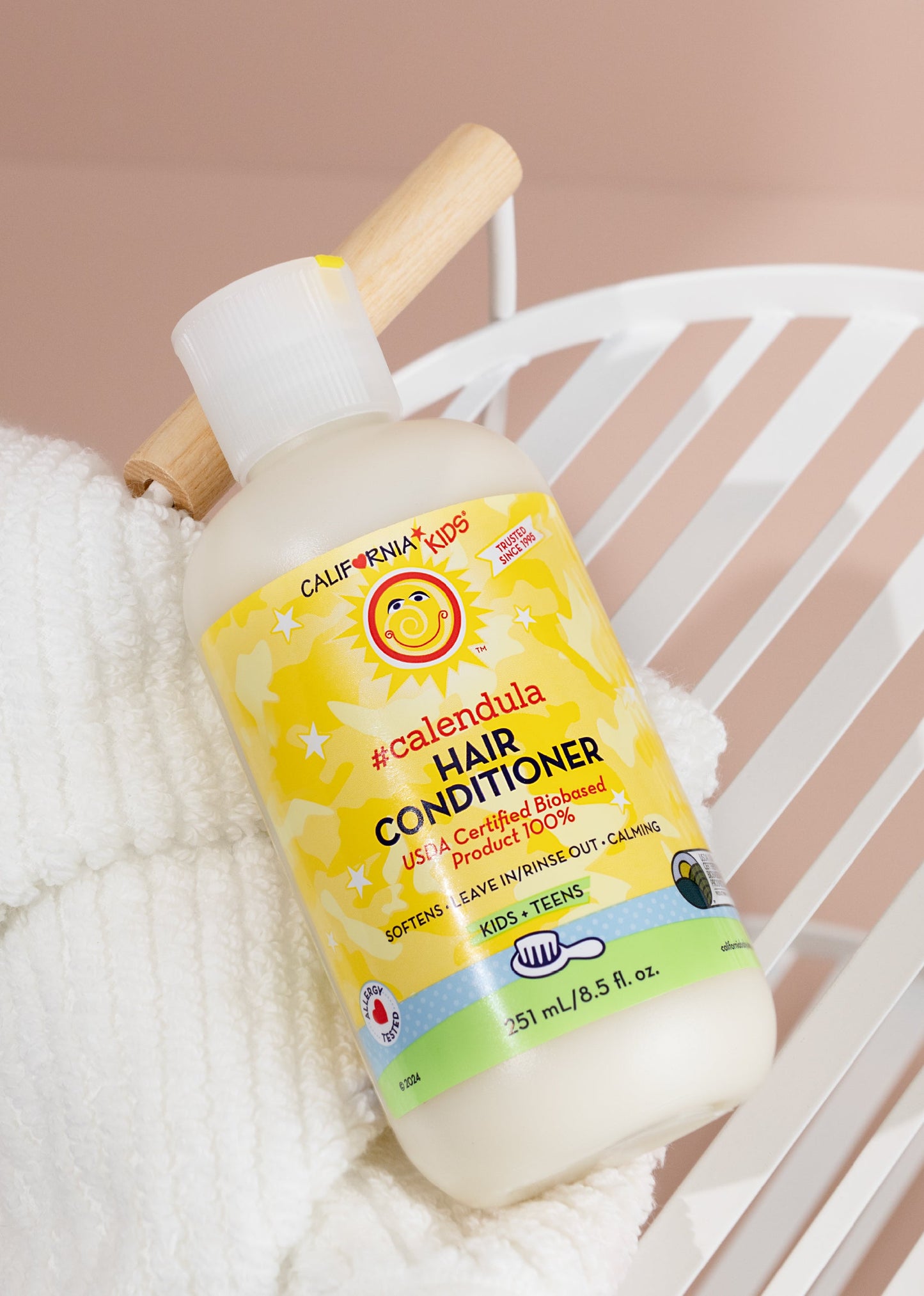 Kids Calendula hair conditioner bottle with wooden pump, yellow label
