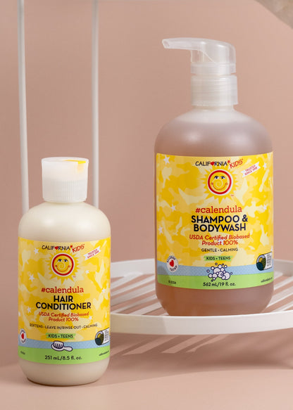 Kids Calendula shampoo & bodywash and hair conditioner bottles side by side
