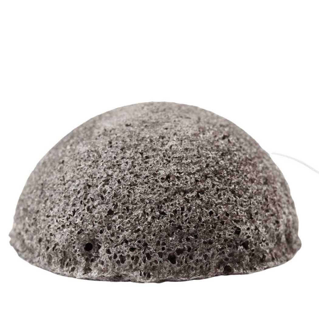 Konjac facial sponge, dark gray porous half-sphere.
