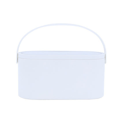 White makeup organizer box with rounded handle and smooth top storage compartment