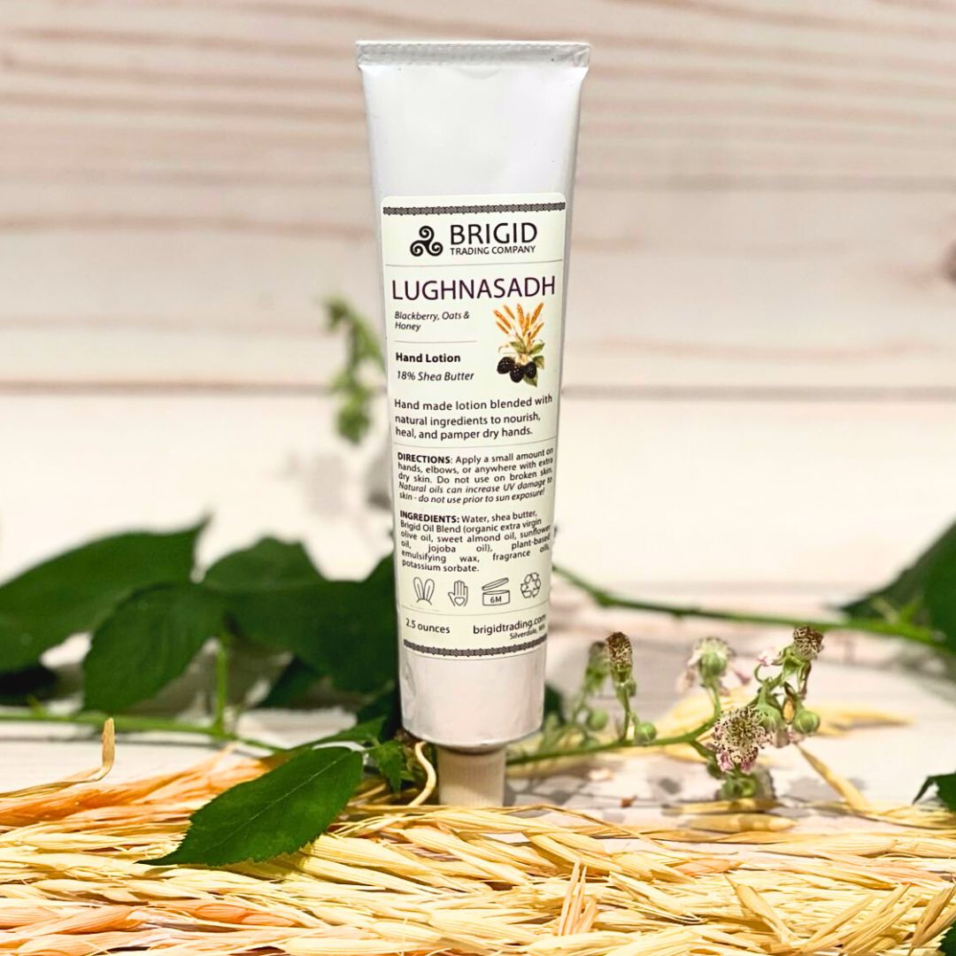 Natural hand lotion tube with LUGHNASADH label and white flip-top cap