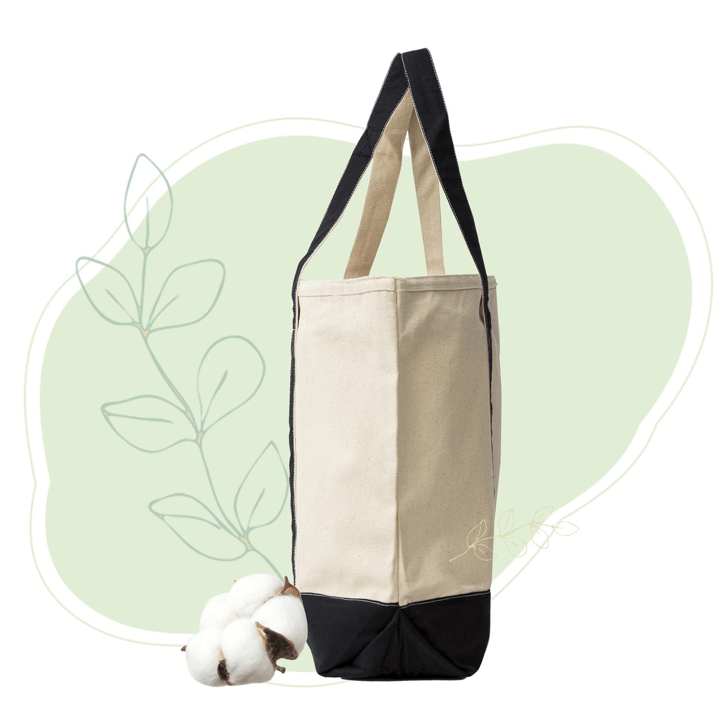 Colorblock canvas tote with cream body, black bottom, and plush teddy accessory.