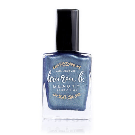 Blue glitter vegan nail polish bottle with black cap