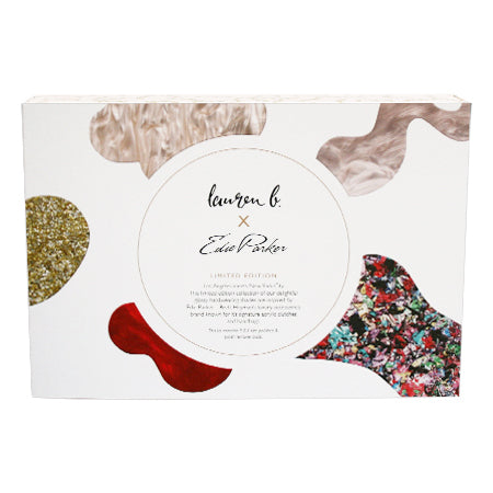 Limited edition nail polish gift box with heart cutouts and confetti design