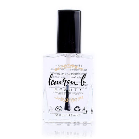 Lauren B Beauty nail polish bottle with black cap, clear formula