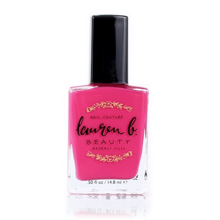 Vegan nail polish bottle in bright pink with black cap