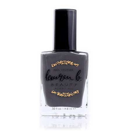 L.A. Smog nail polish bottle with glossy dark formula and gold label