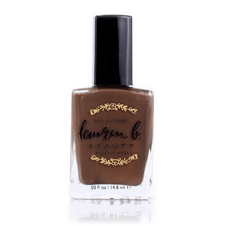 Nude No. 5 nail polish bottle with black cap, brown nude shade