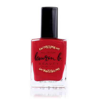Rodeo Drive nail polish bottle with black cap, red lacquer.