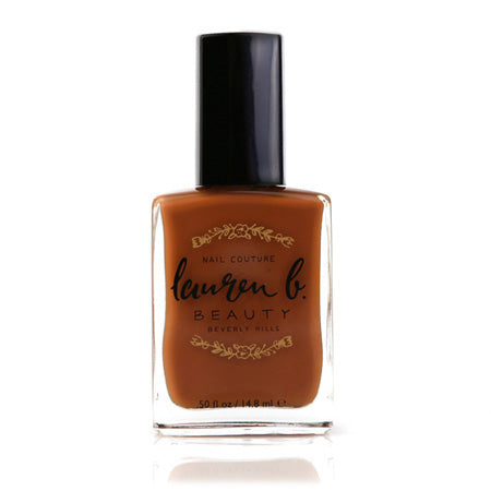 Nail polish bottle in warm bronze-brown with black cap
