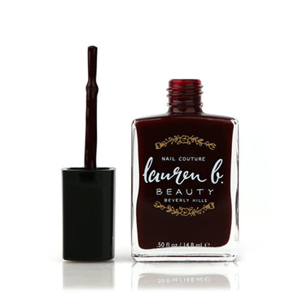 Lauren b. Beauty nail polish bottle with brush applicator, burgundy shade