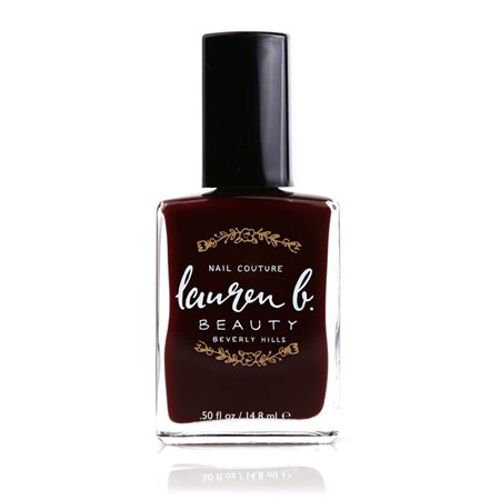 Burgundy nail polish bottle with black cap and Lauren b. Beauty label