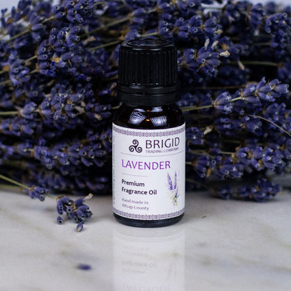 Lavender essential fragrance oil bottle with black cap and white label
