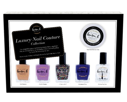 Luxury nail polish set with bottles and polish remover disc in a gift box
