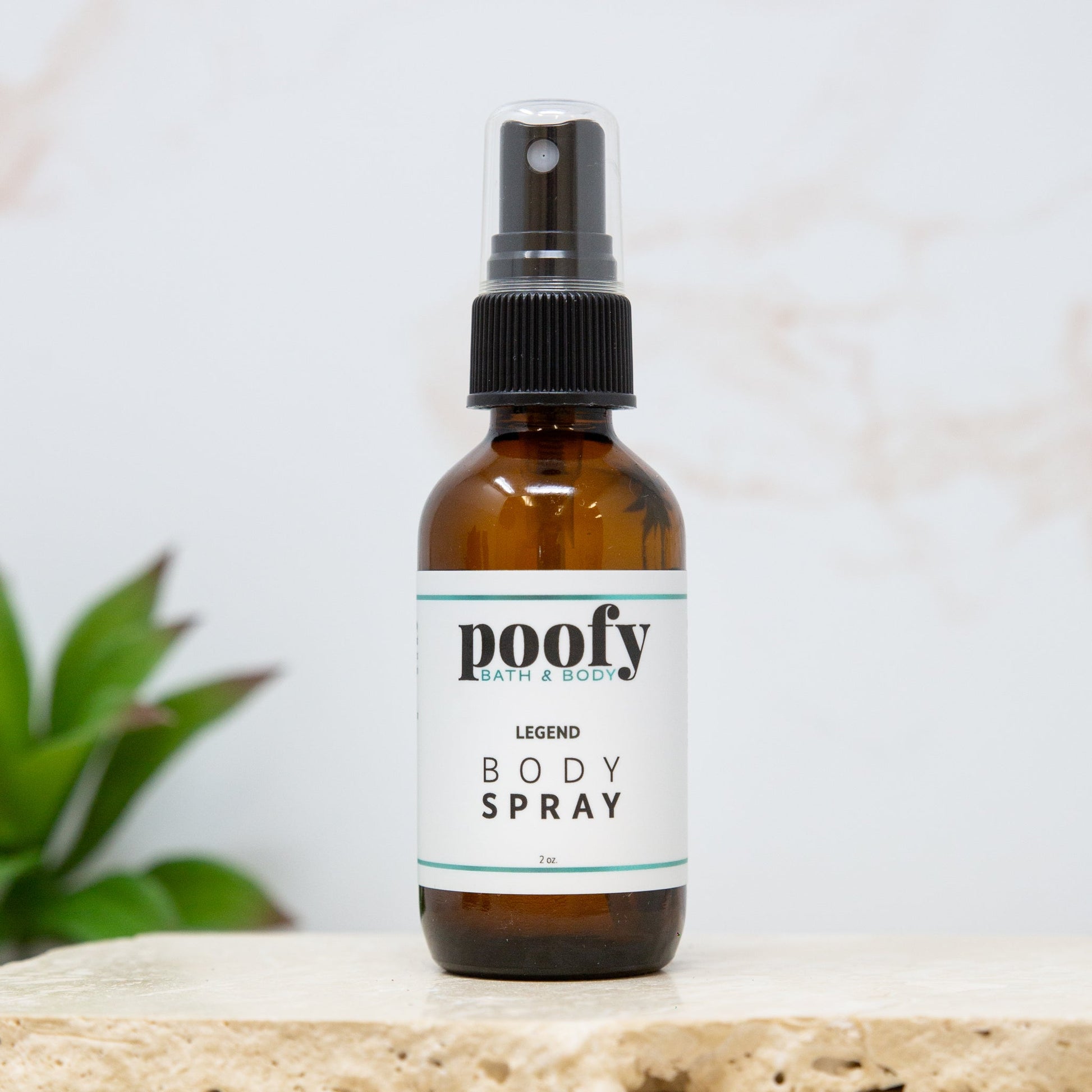 Poofy Legend body spray in amber glass pump bottle