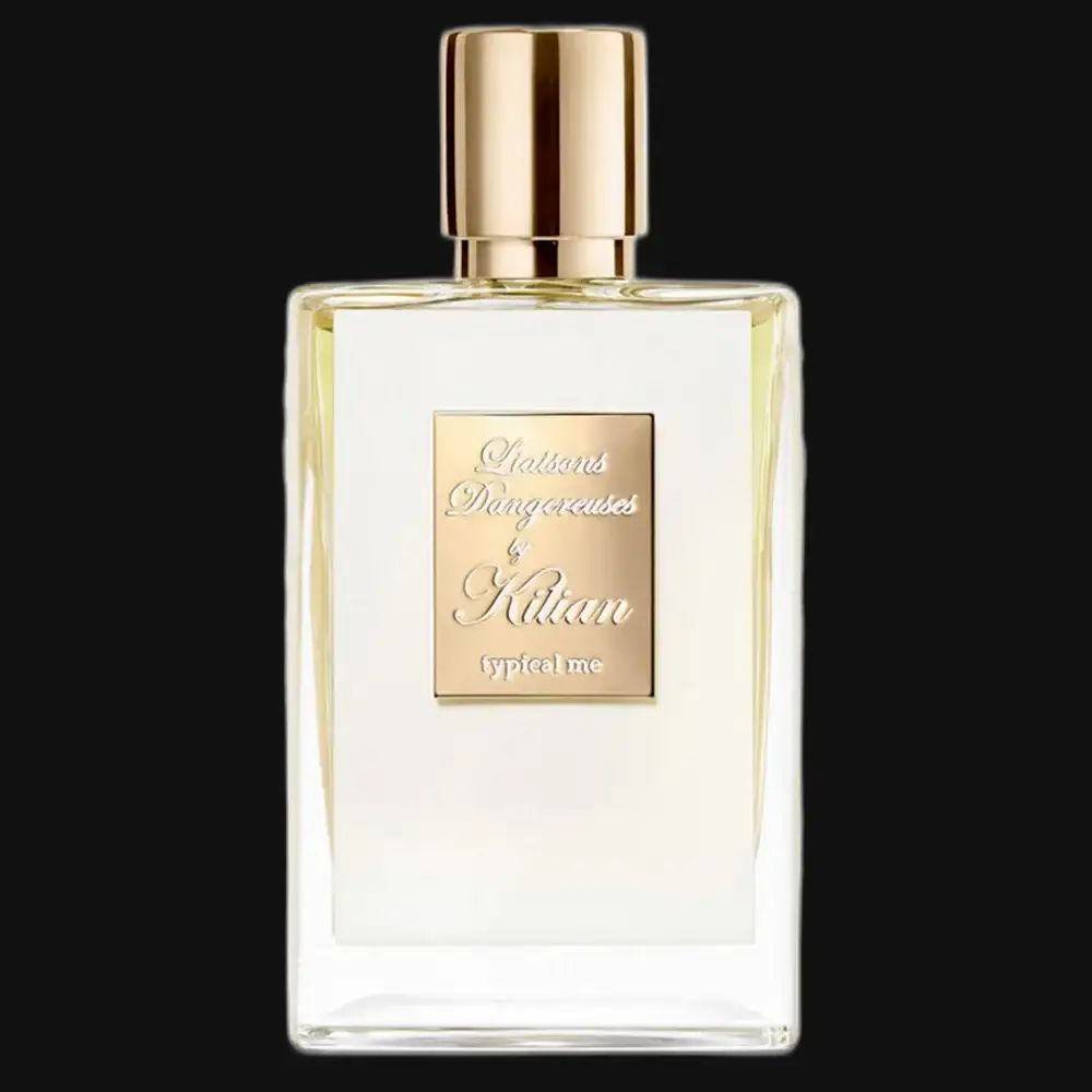 Perfume bottle with gold cap and clear glass, gold label
