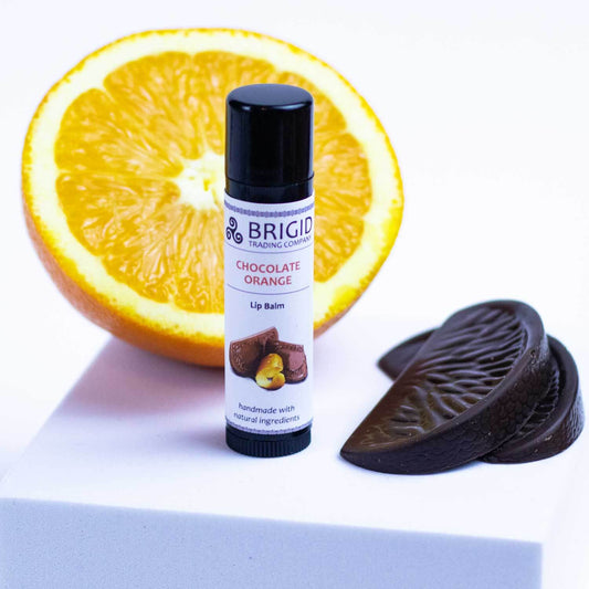 Natural lip balm tube with black cap; chocolate-orange lip balm label.